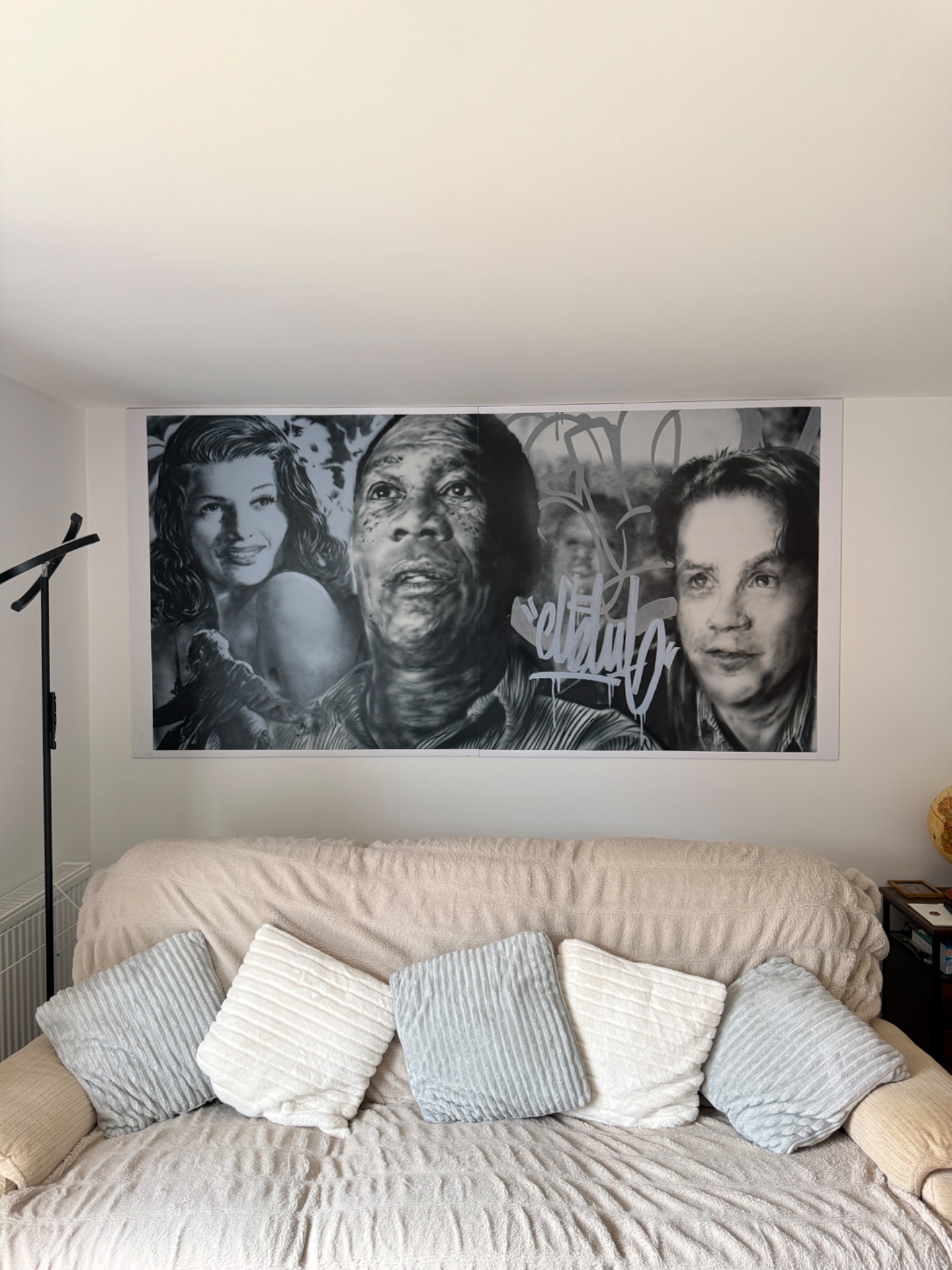 Monochrome SlapUp installed above a sofa
